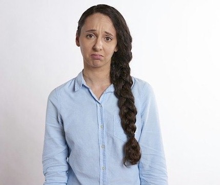 Picture of a girl with a sad questioning face